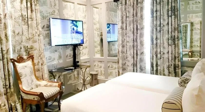 Bed in Kamiseta Hotel