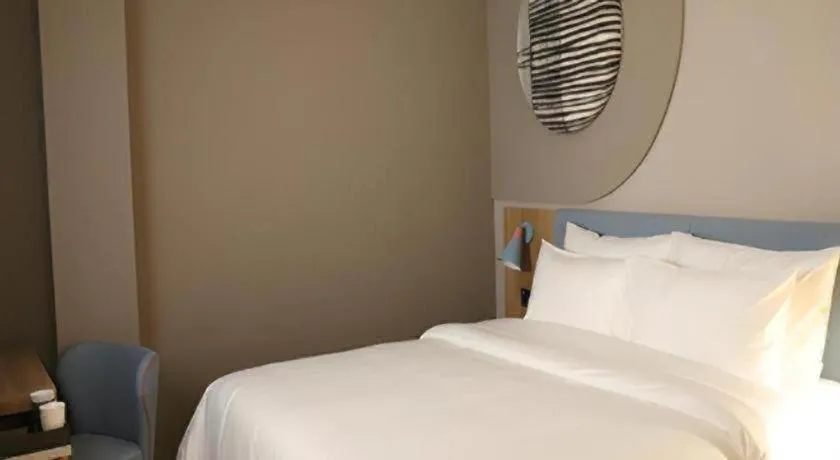 Bed in Home Inn Neo Shanghai Railway Station