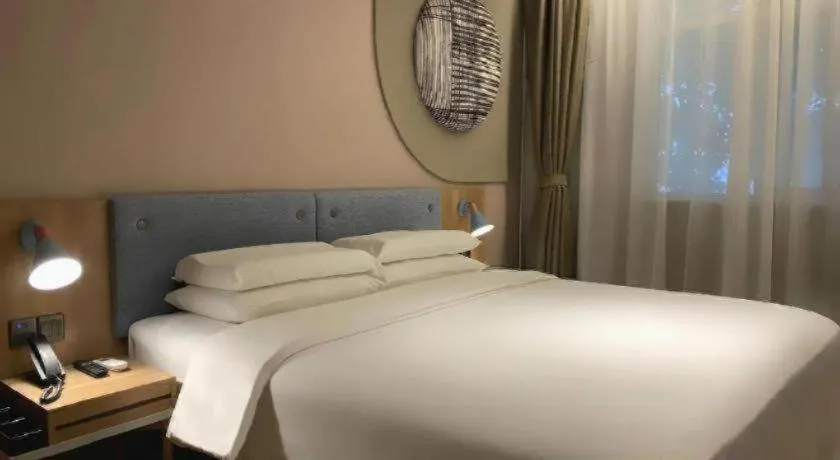 Bed in Home Inn Neo Shanghai Railway Station