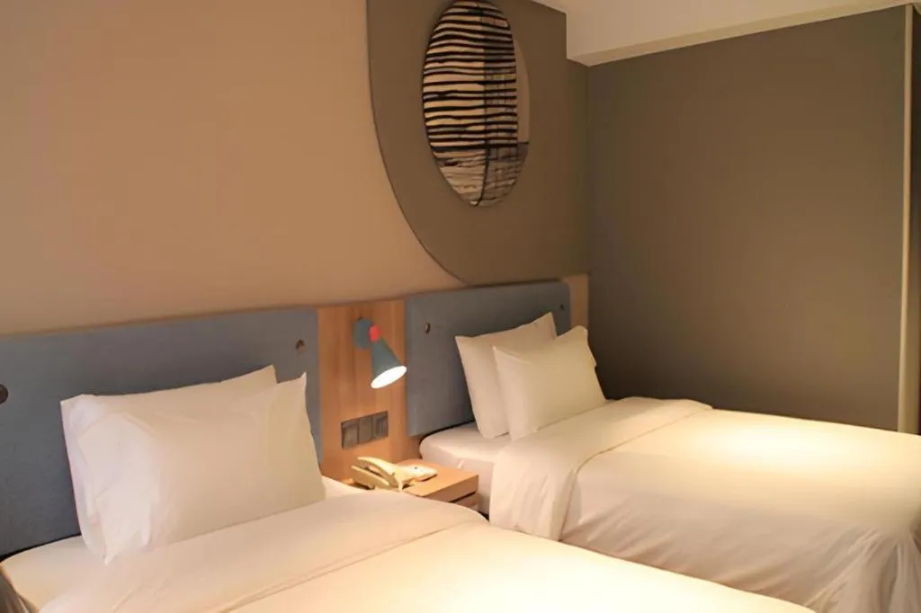 Bed in Home Inn Neo Shanghai Railway Station