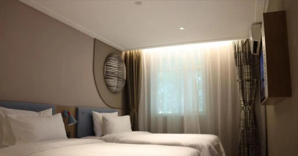 Bed in Home Inn Neo Shanghai Railway Station