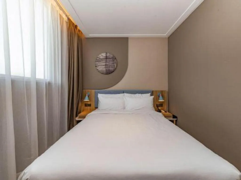 Bed in Home Inn Neo Shanghai Railway Station