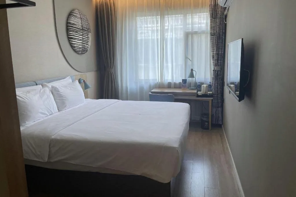 Bed in Home Inn Neo Shanghai Railway Station