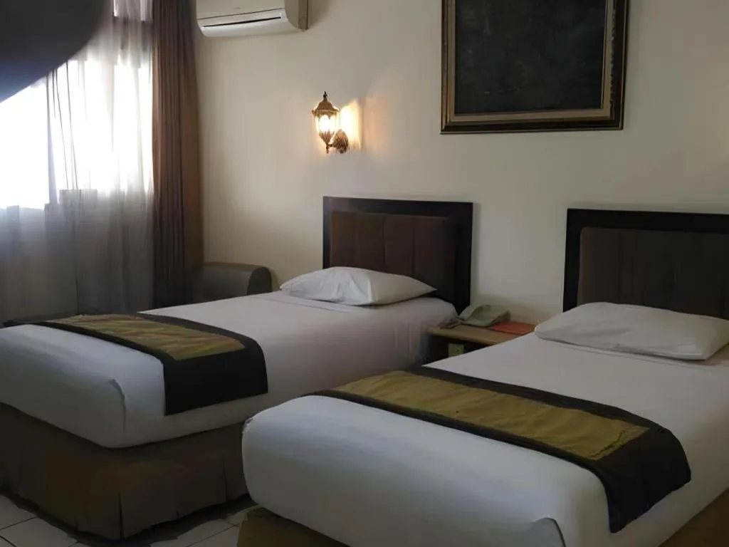 Bed in d'Arcici Hotel Plumpang
