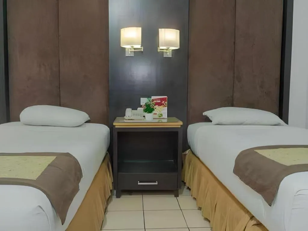Bed in d'Arcici Hotel Plumpang