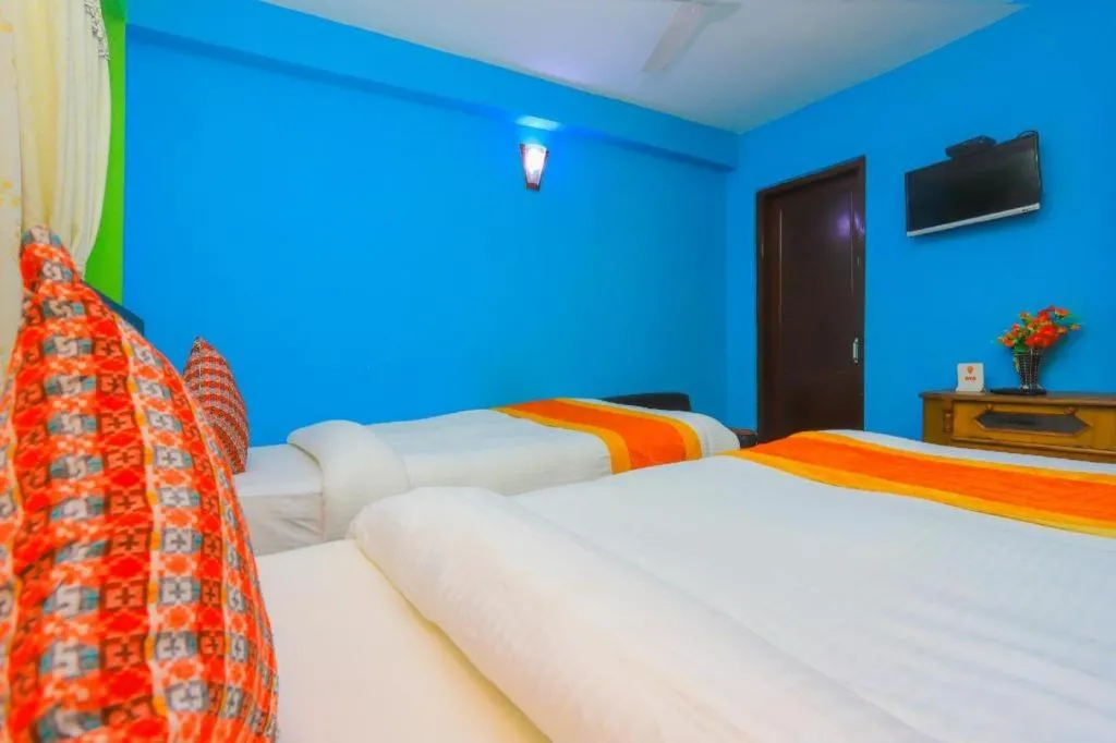 Bed in OYO 492 Hotel Yeti Home
