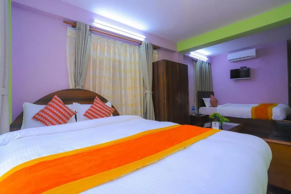 Bed in OYO 492 Hotel Yeti Home