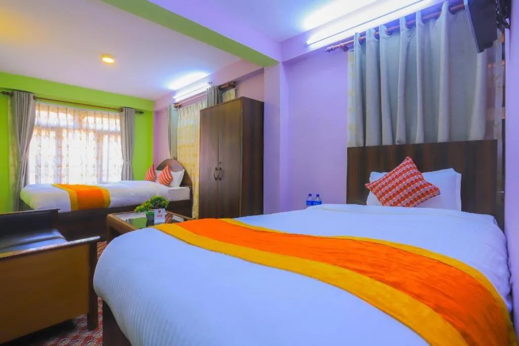 Bed in OYO 492 Hotel Yeti Home