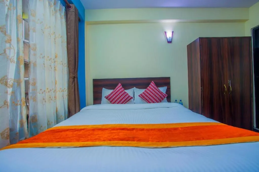 Bed in OYO 492 Hotel Yeti Home
