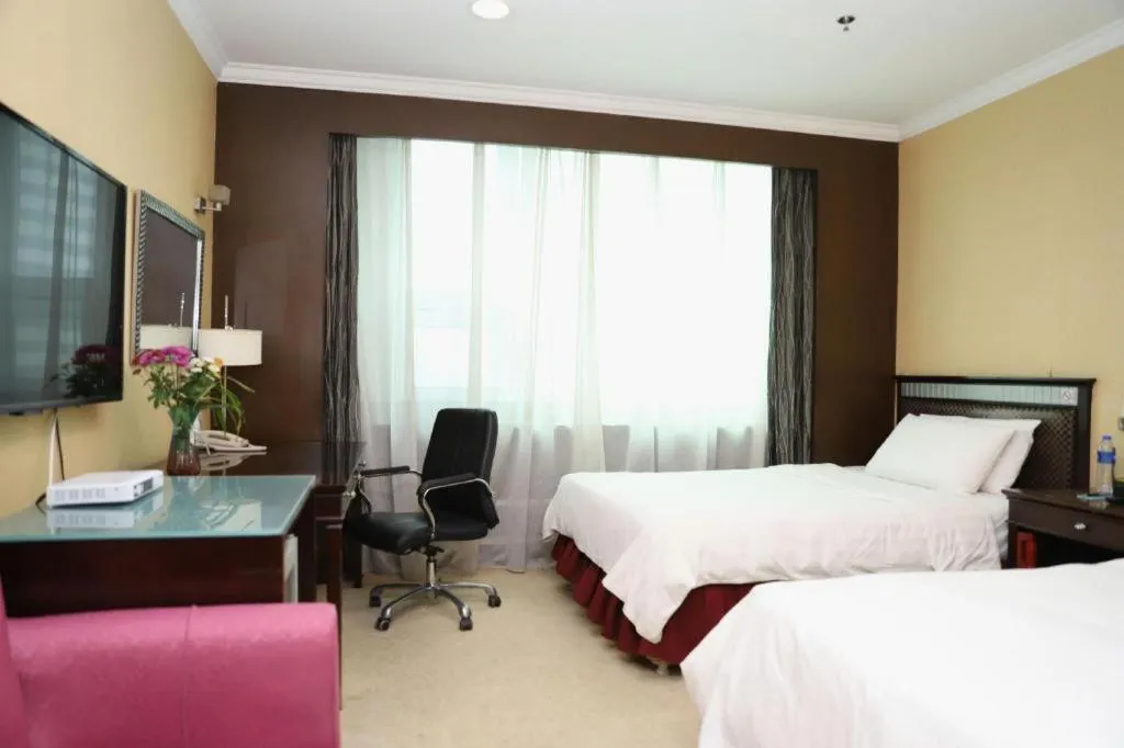 Bed in Changchun Zhuozhan Days Hotel