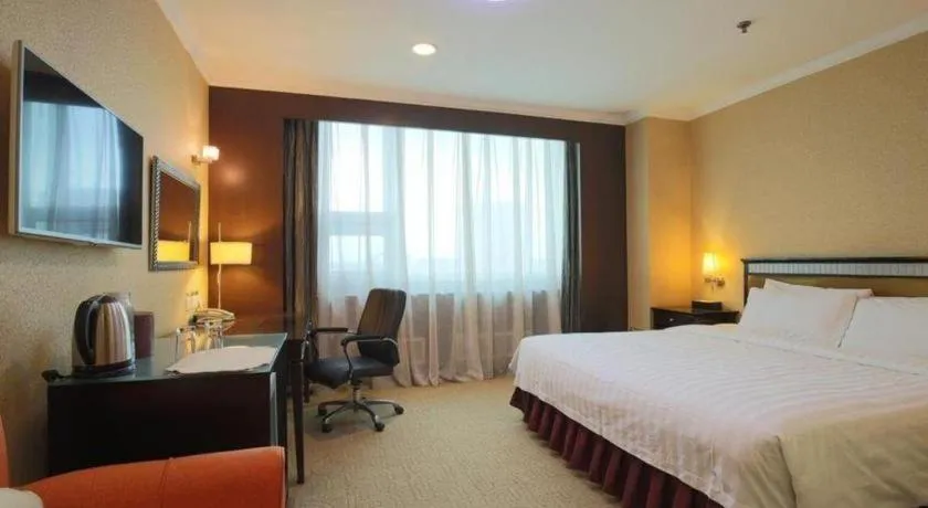 Bed in Changchun Zhuozhan Days Hotel