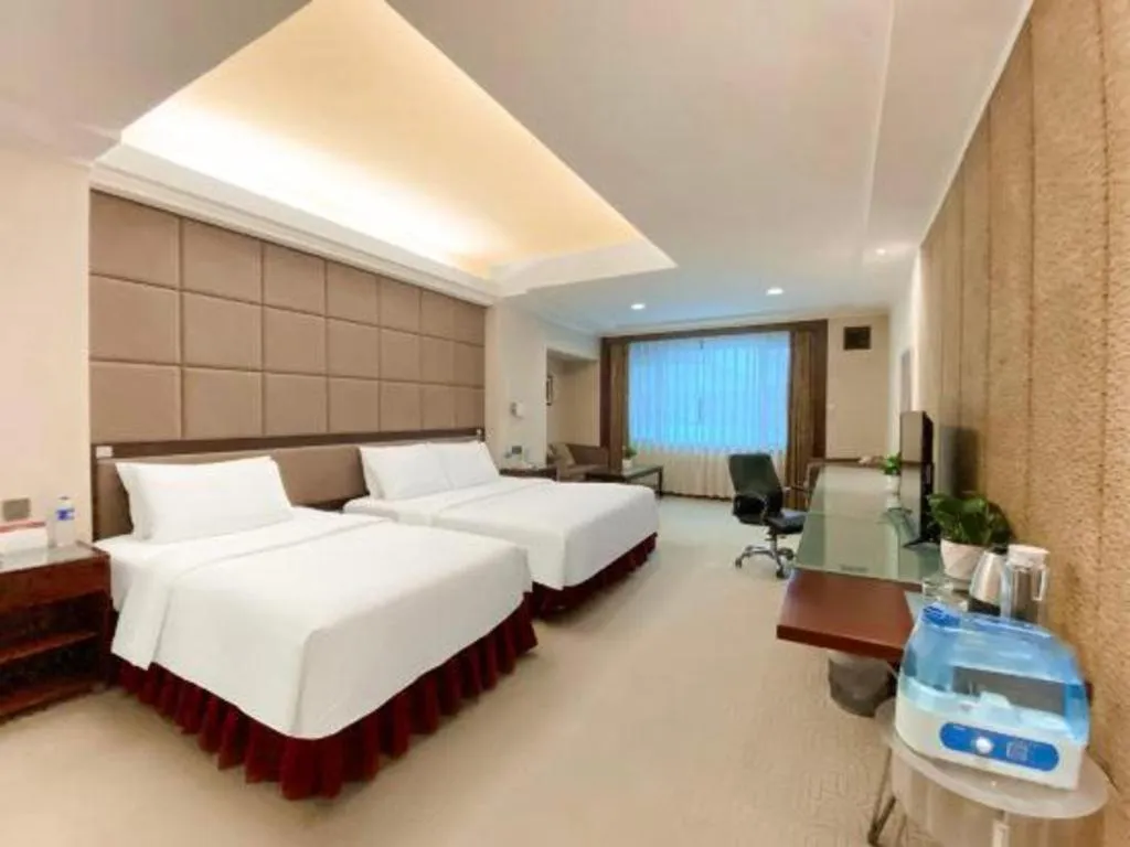 Bed in Changchun Zhuozhan Days Hotel
