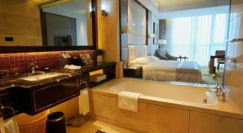Bed in Jin Jiang Mingcheng Hotel