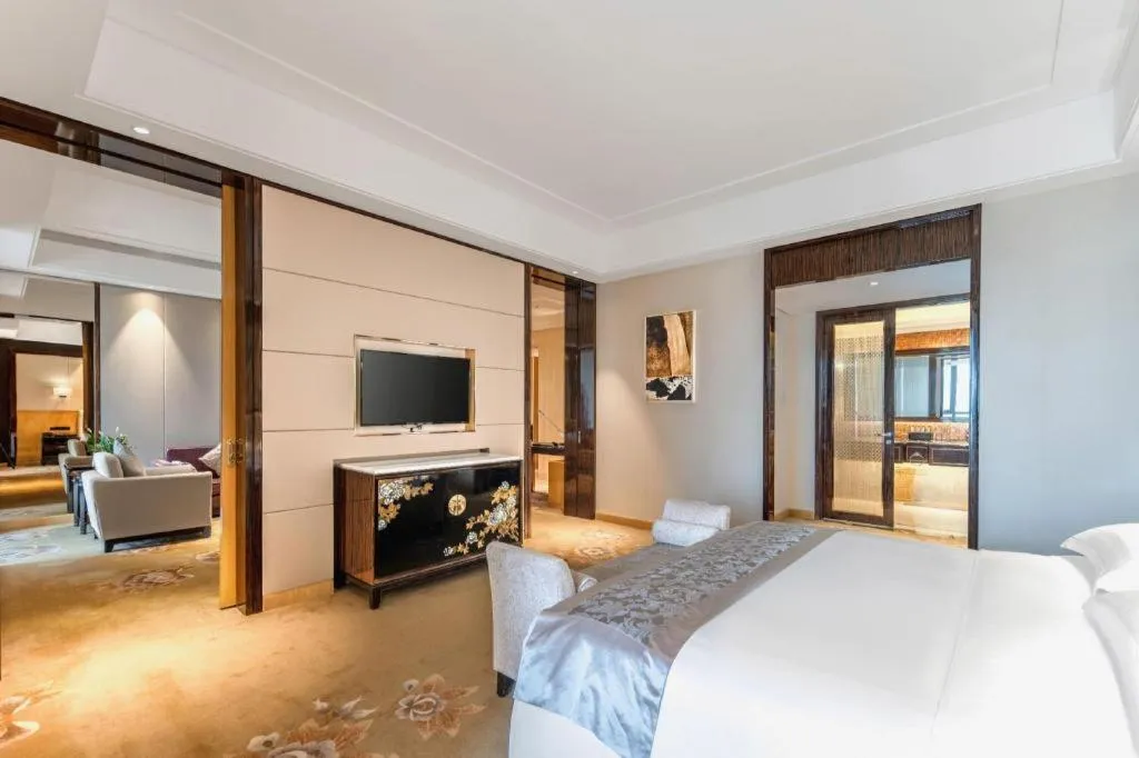 Bed in Jin Jiang Mingcheng Hotel