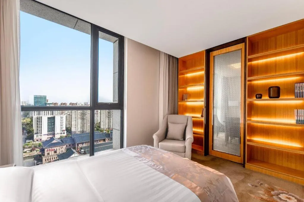 Bed in Jin Jiang Mingcheng Hotel