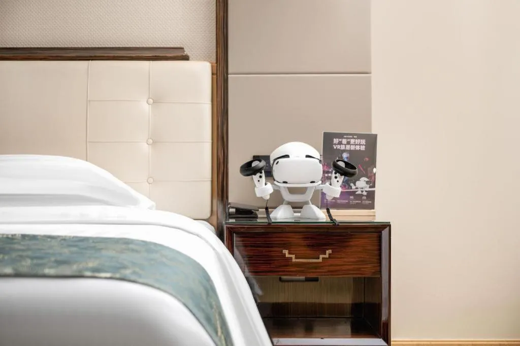 Bed in Jin Jiang Mingcheng Hotel