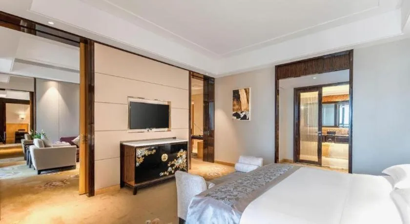 Bed in Jin Jiang Mingcheng Hotel