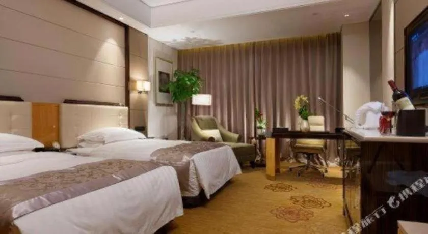 Bed in Jin Jiang Mingcheng Hotel