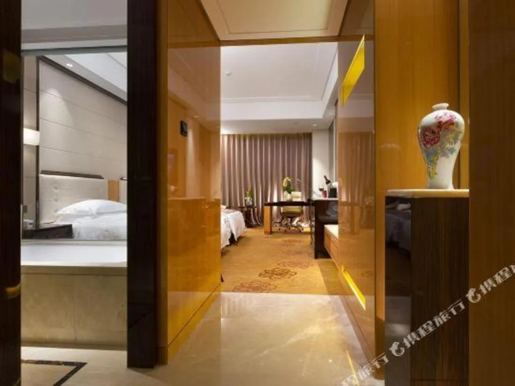 Bed in Jin Jiang Mingcheng Hotel