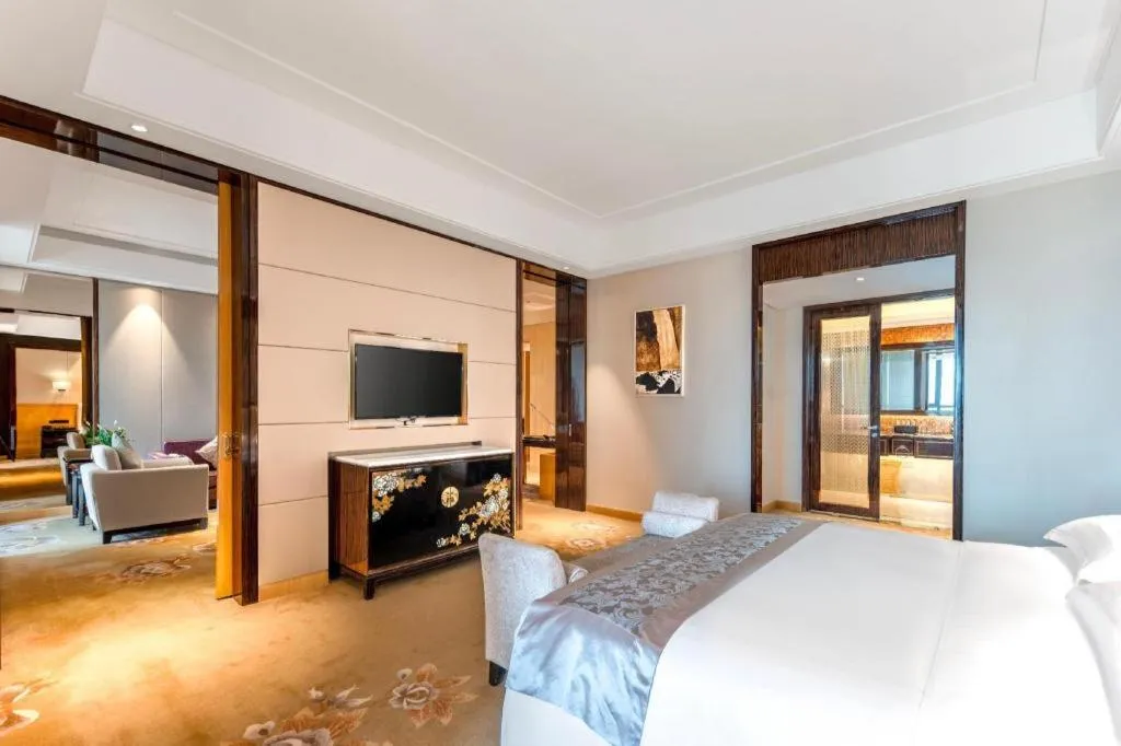 Bed in Jin Jiang Mingcheng Hotel