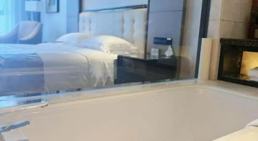 Bed in Jin Jiang Mingcheng Hotel Bed in Jin Jiang Mingcheng Hotel