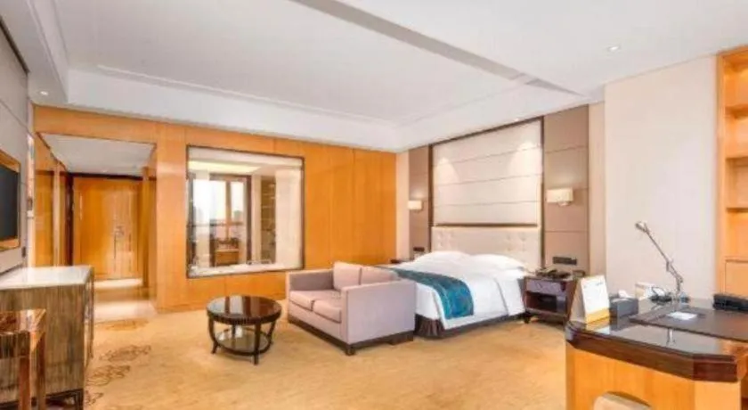 Bed in Jin Jiang Mingcheng Hotel