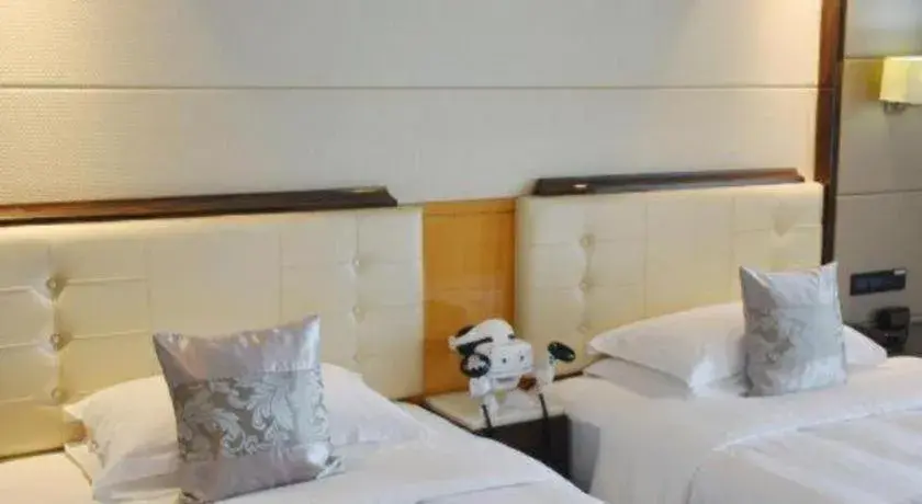 Bed in Jin Jiang Mingcheng Hotel Bed in Jin Jiang Mingcheng Hotel