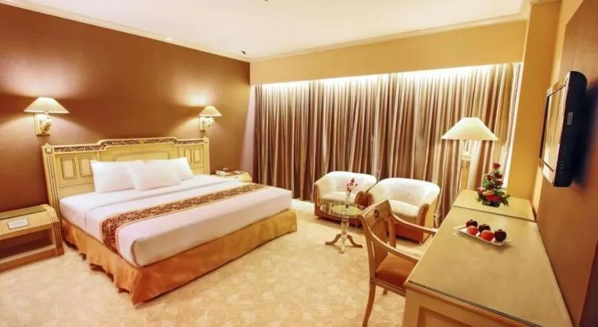 Bed in Kartika Chandra Hotel