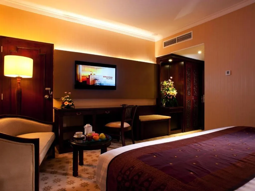 Bed in Kartika Chandra Hotel