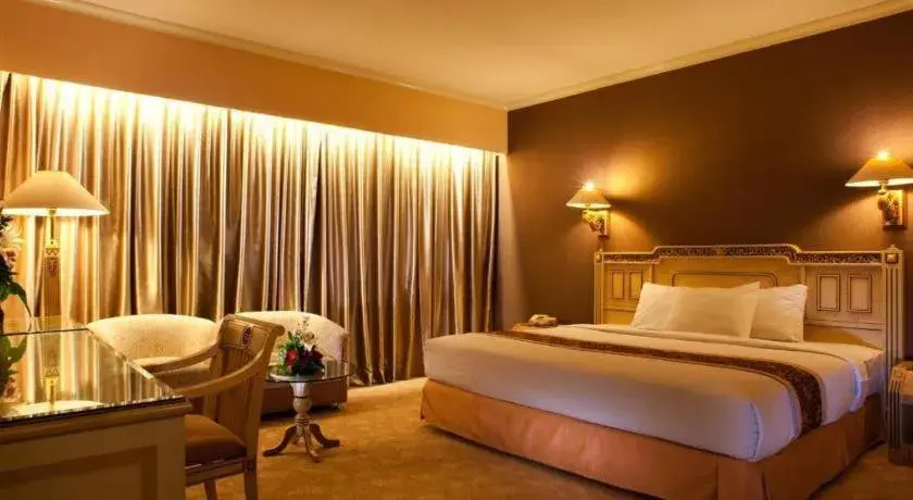 Bed in Kartika Chandra Hotel Bed in Kartika Chandra Hotel