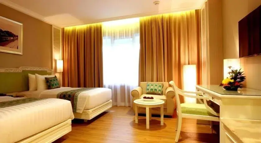 Bed in Kartika Chandra Hotel Bed in Kartika Chandra Hotel