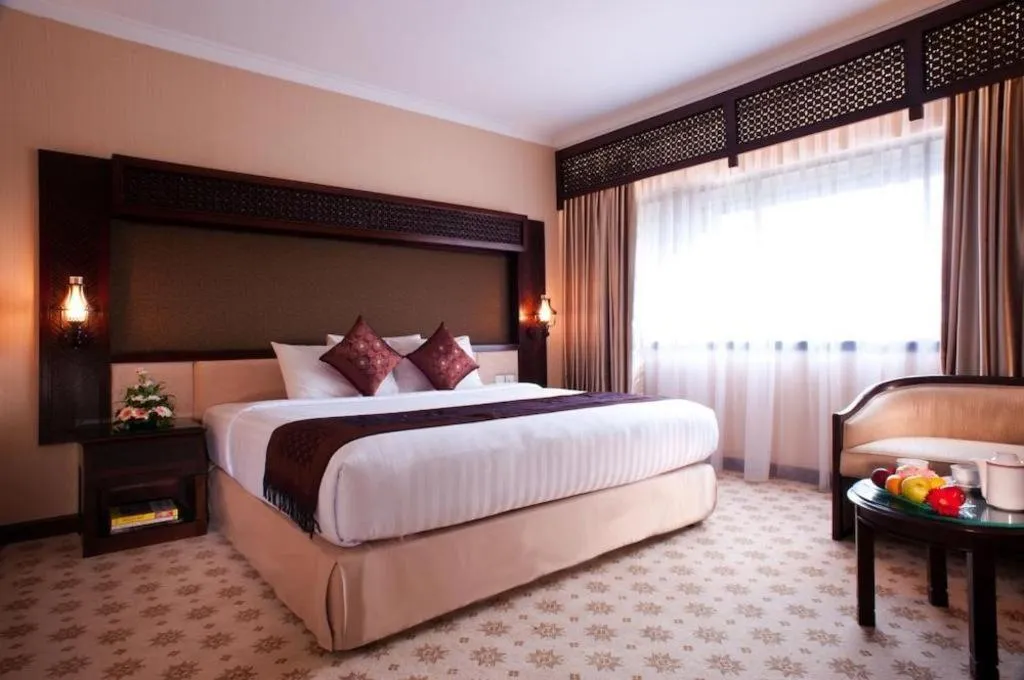 Bed in Kartika Chandra Hotel