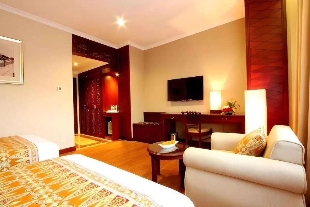 Bed in Kartika Chandra Hotel