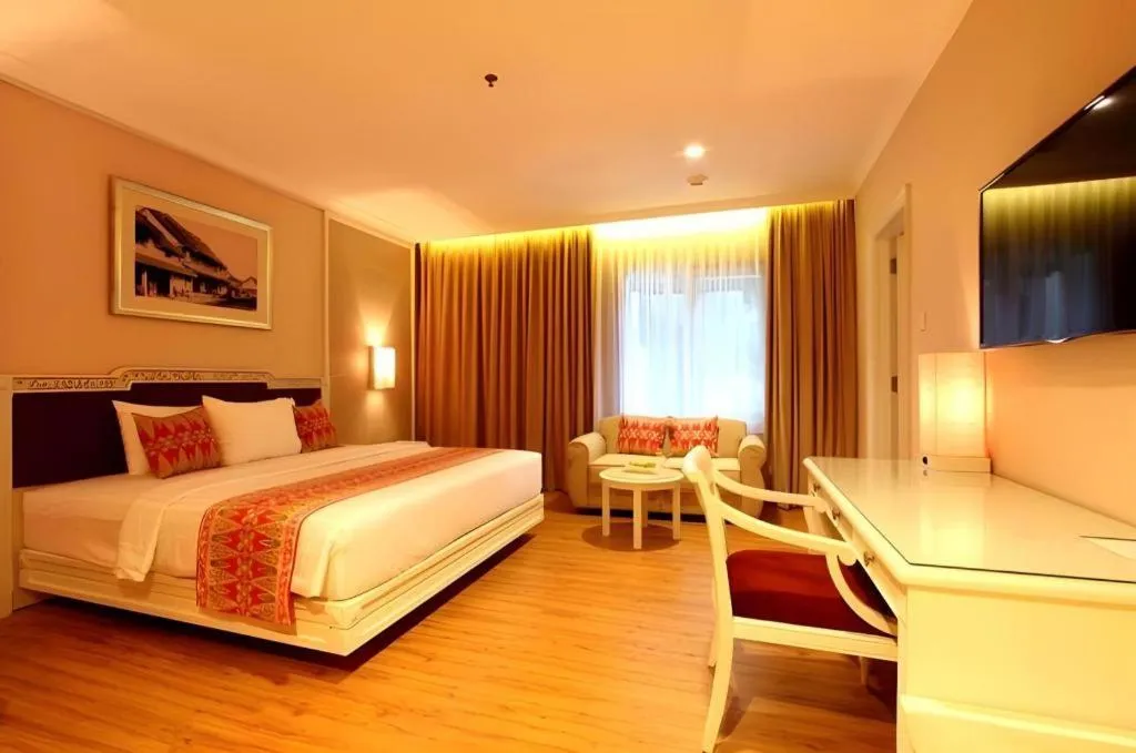 Bed in Kartika Chandra Hotel