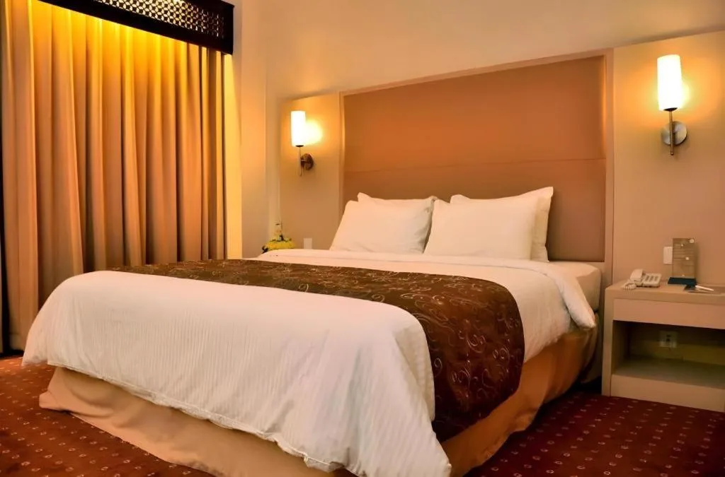 Bed in Kartika Chandra Hotel