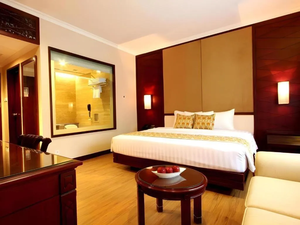 Bed in Kartika Chandra Hotel