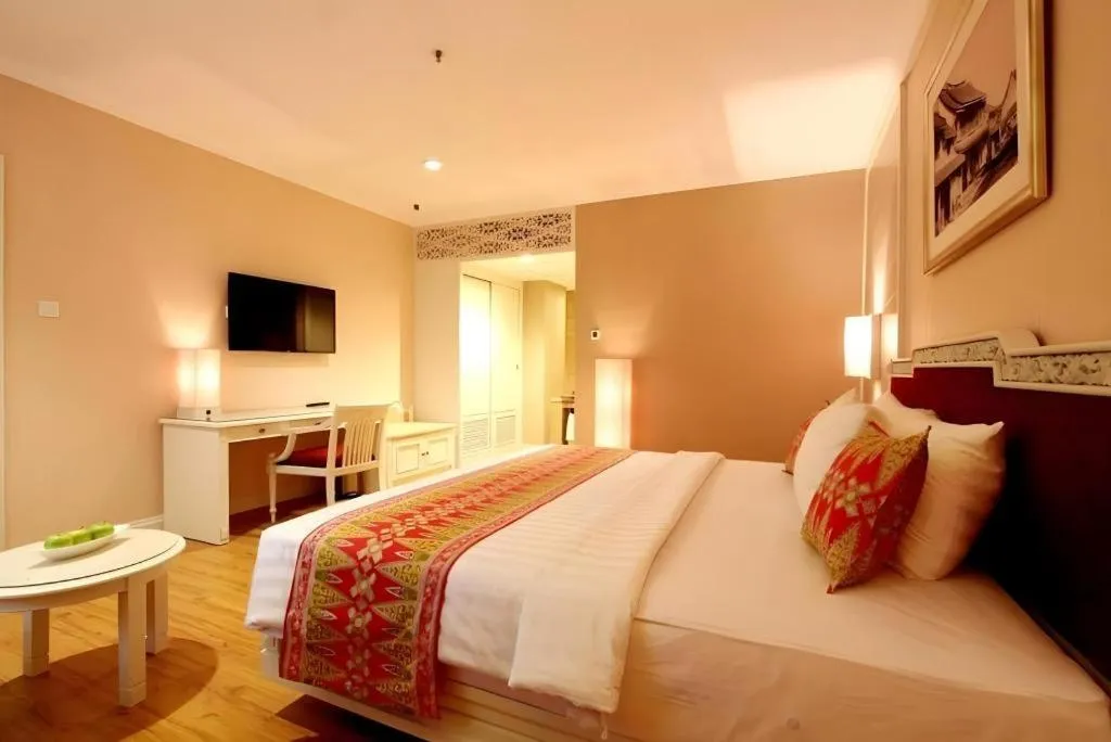 Bed in Kartika Chandra Hotel