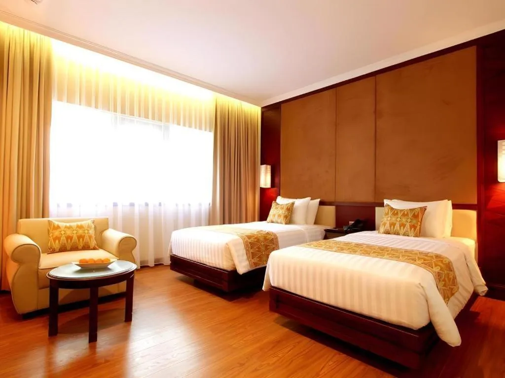 Bed in Kartika Chandra Hotel