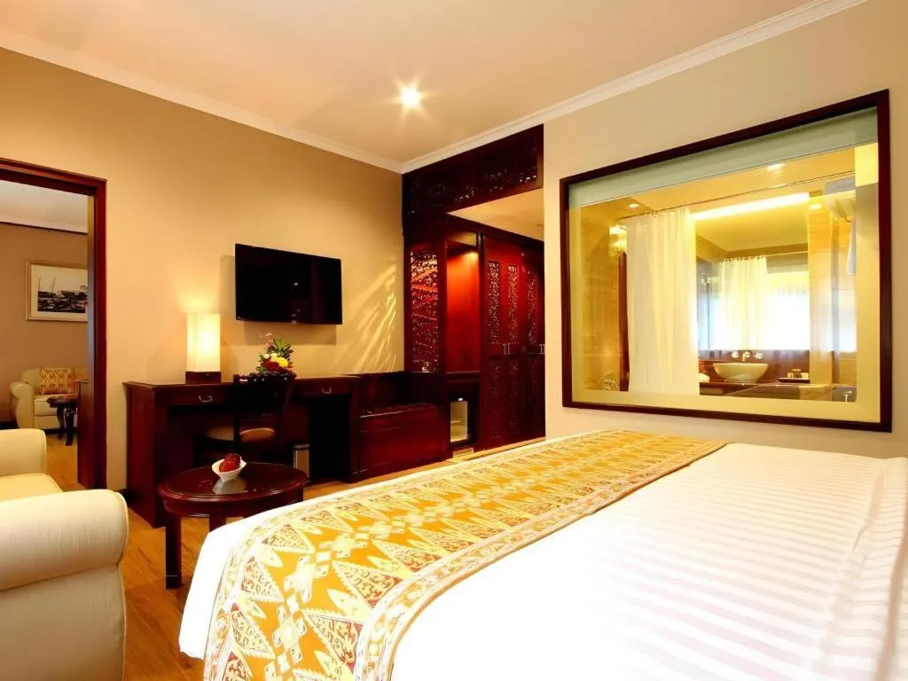Bed in Kartika Chandra Hotel