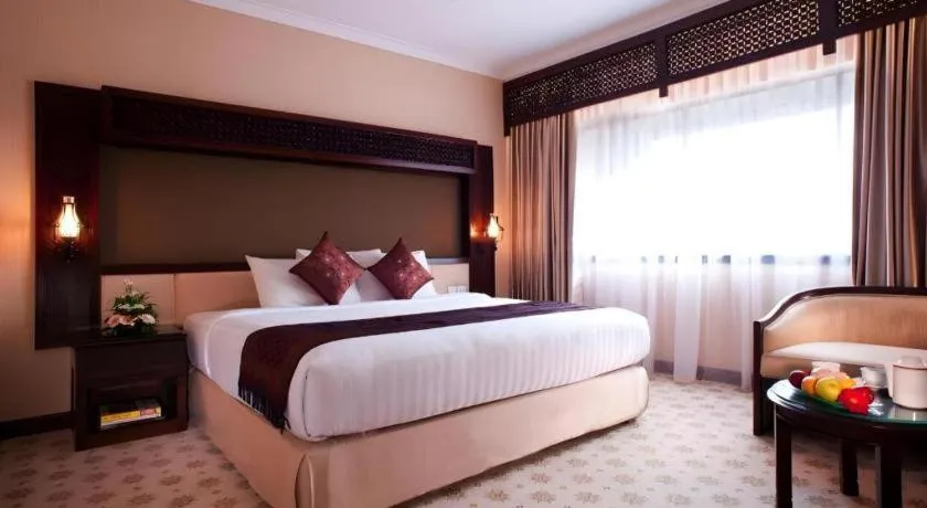 Bed in Kartika Chandra Hotel