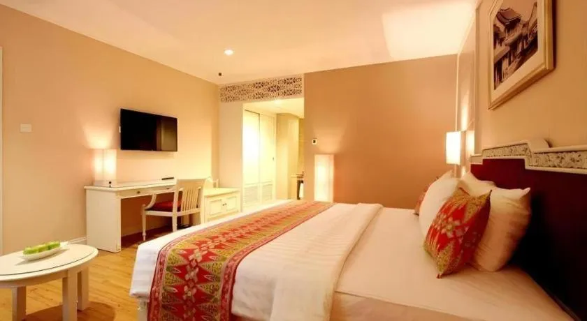 Bed in Kartika Chandra Hotel