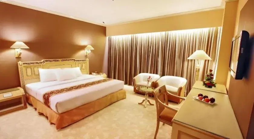 Bed in Kartika Chandra Hotel Bed in Kartika Chandra Hotel