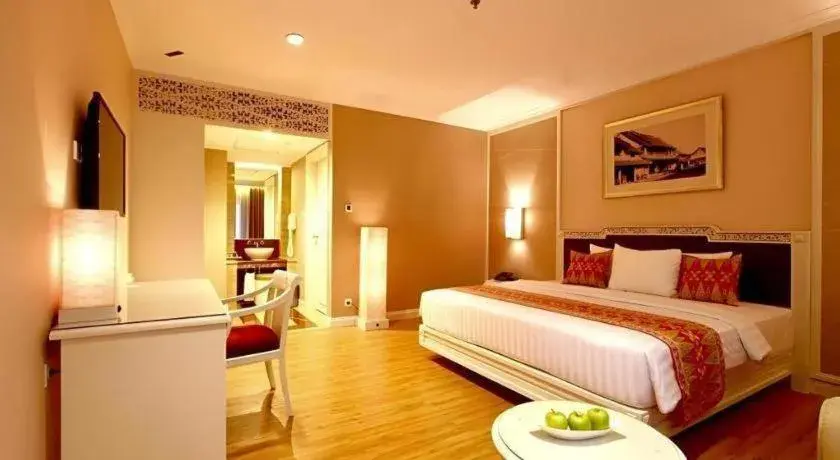 Bed in Kartika Chandra Hotel Bed in Kartika Chandra Hotel