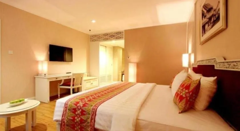 Bed in Kartika Chandra Hotel