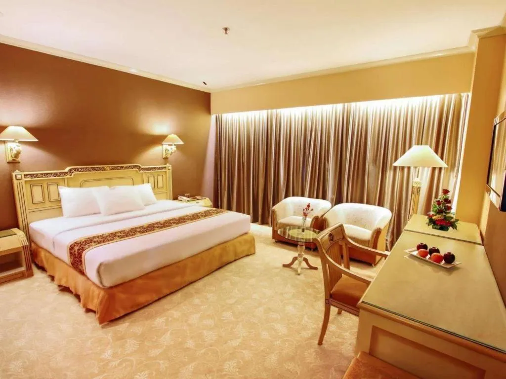 Bed in Kartika Chandra Hotel