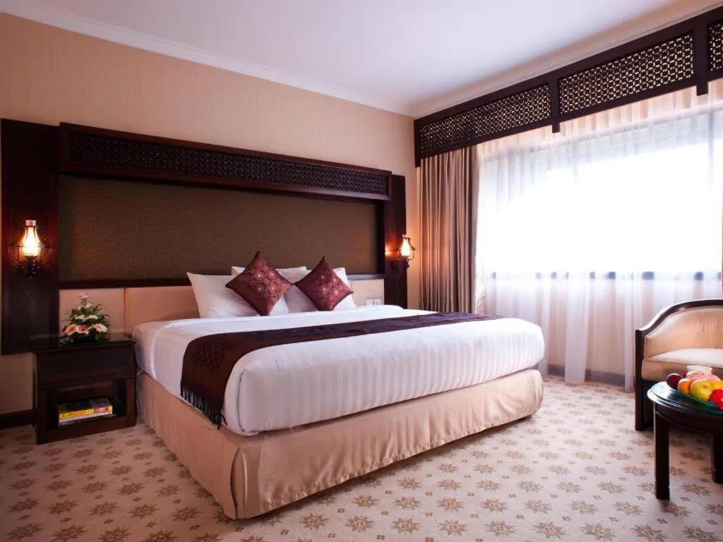 Bed in Kartika Chandra Hotel