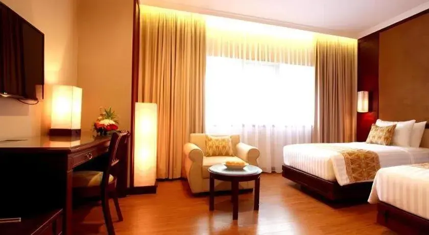 Bed in Kartika Chandra Hotel Bed in Kartika Chandra Hotel