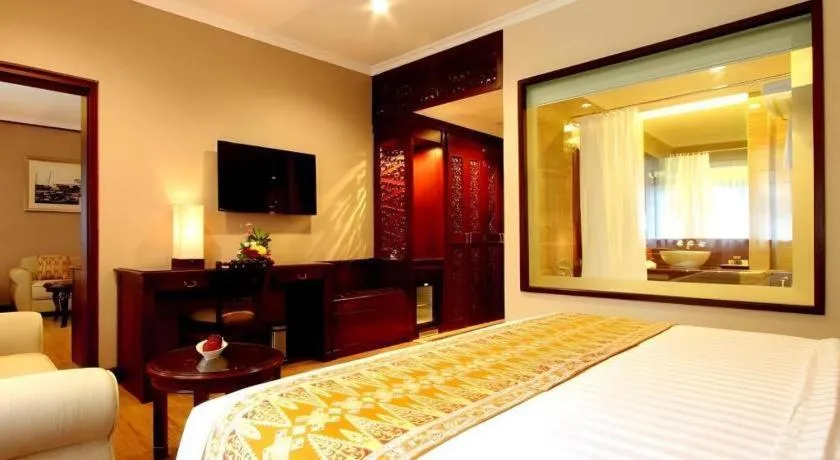 Bed in Kartika Chandra Hotel