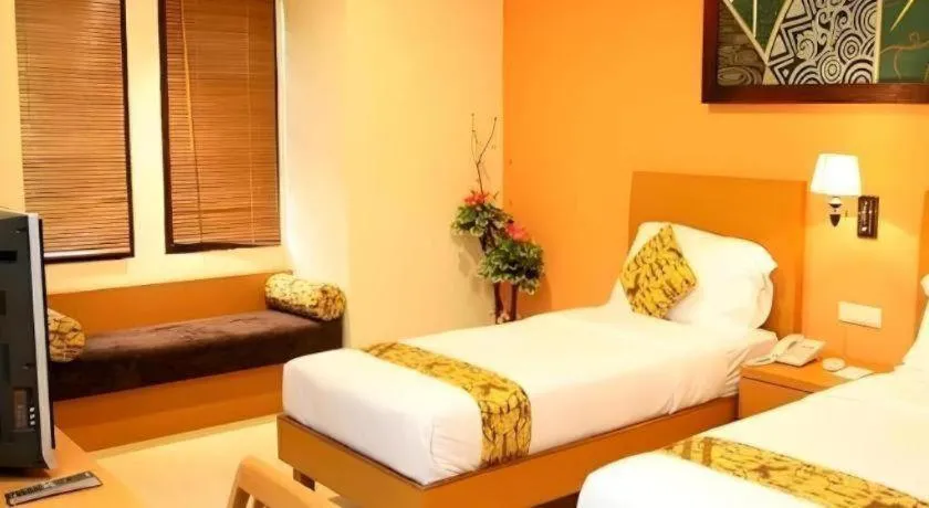 Bed in The Luxio Hotel