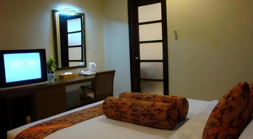 Bed in The Luxio Hotel